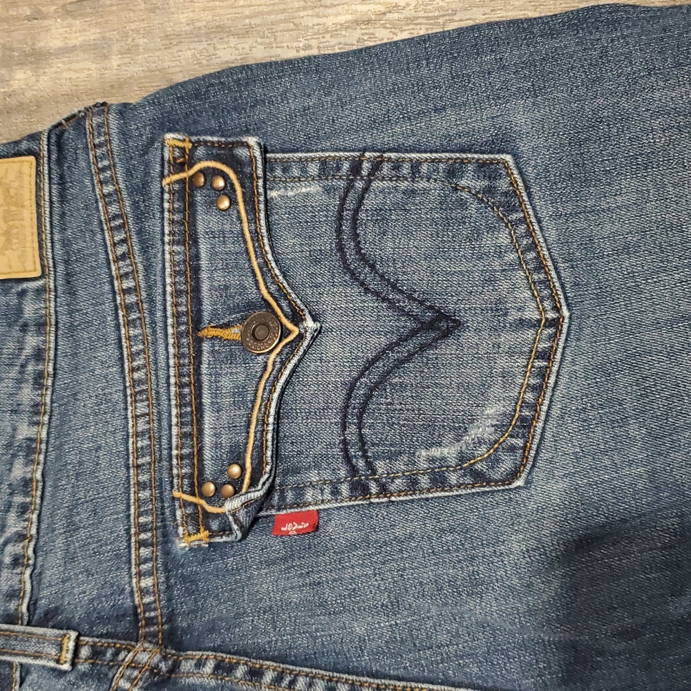Levi 515 boot cut womens size 12M Blue Jeans Casual Medium Wash Distressed - Picture 9 of 12